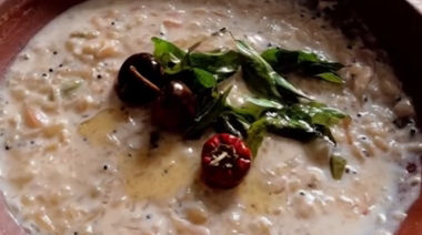 Traditional Kerala raw mango pachadi made with coconut milk